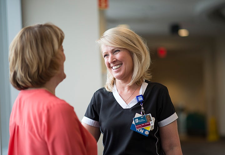 Healthcare professional talking to patient