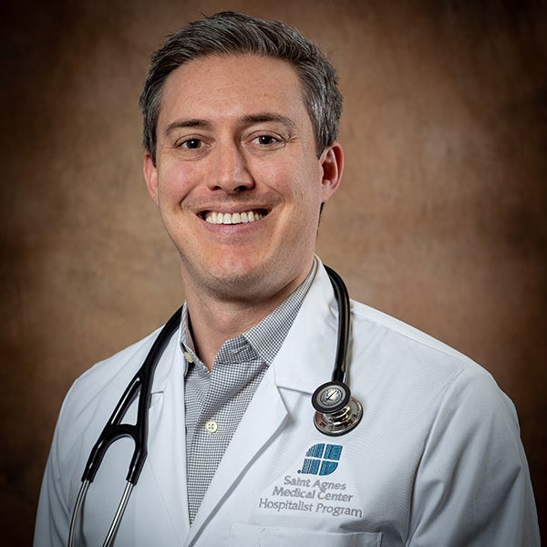 Christopher B. Smith, MD- Medical Director