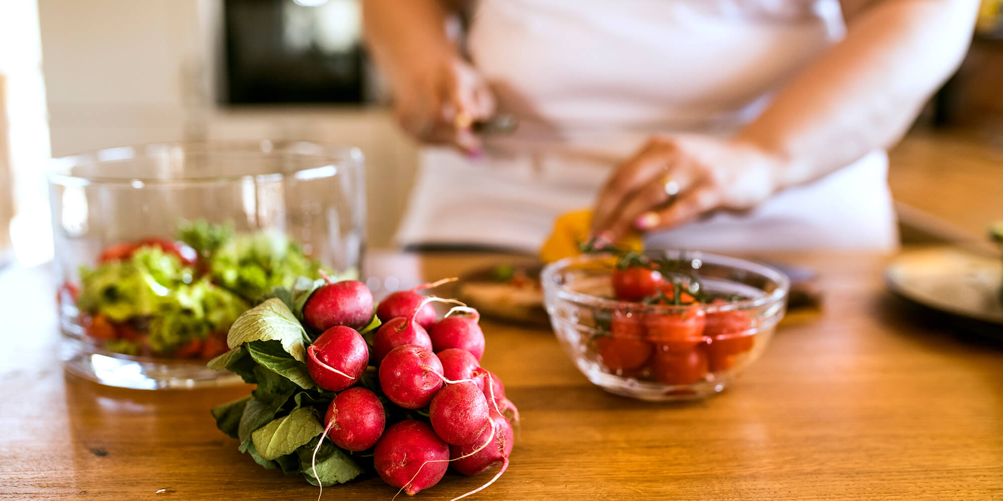 Woman cutting vegetables