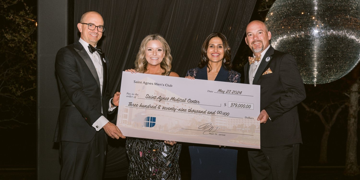 Foundation leaders present check