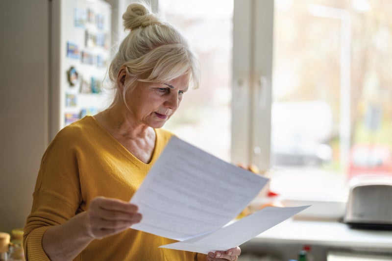 Woman reviewing medical bill